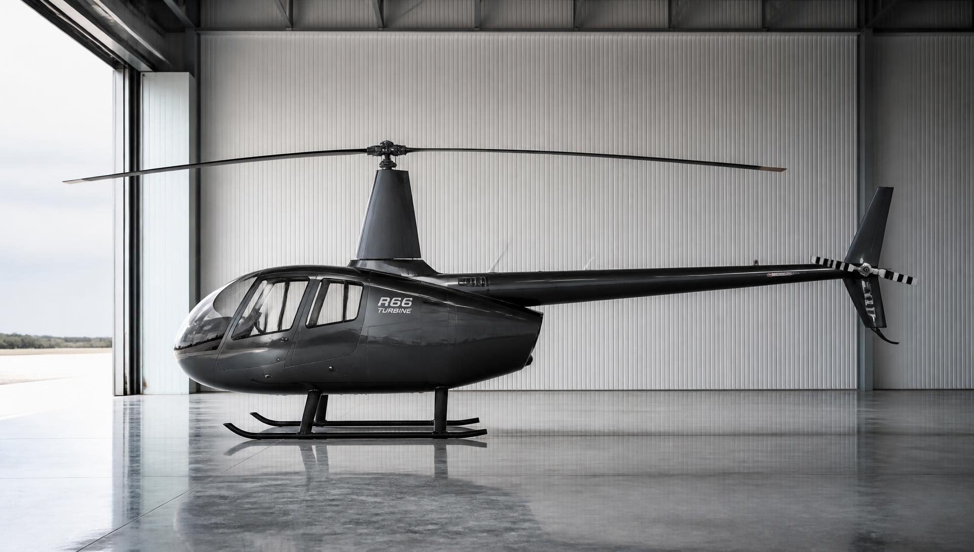 Robinson R66 turbine helicopter in a clean hangar